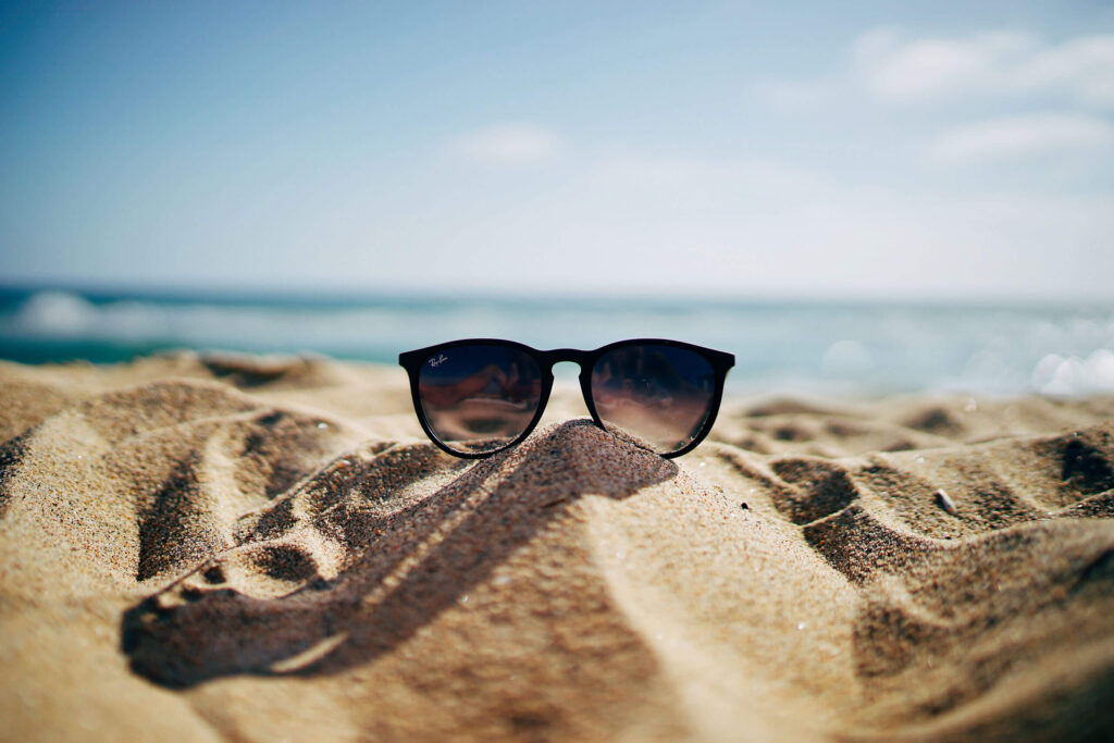 Spiaggia e occhiali da sole